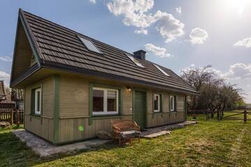Фото номера Дом с 2 спальнями Дома для отпуска KTA TARPAN Mały Domek г. Masiewo 22